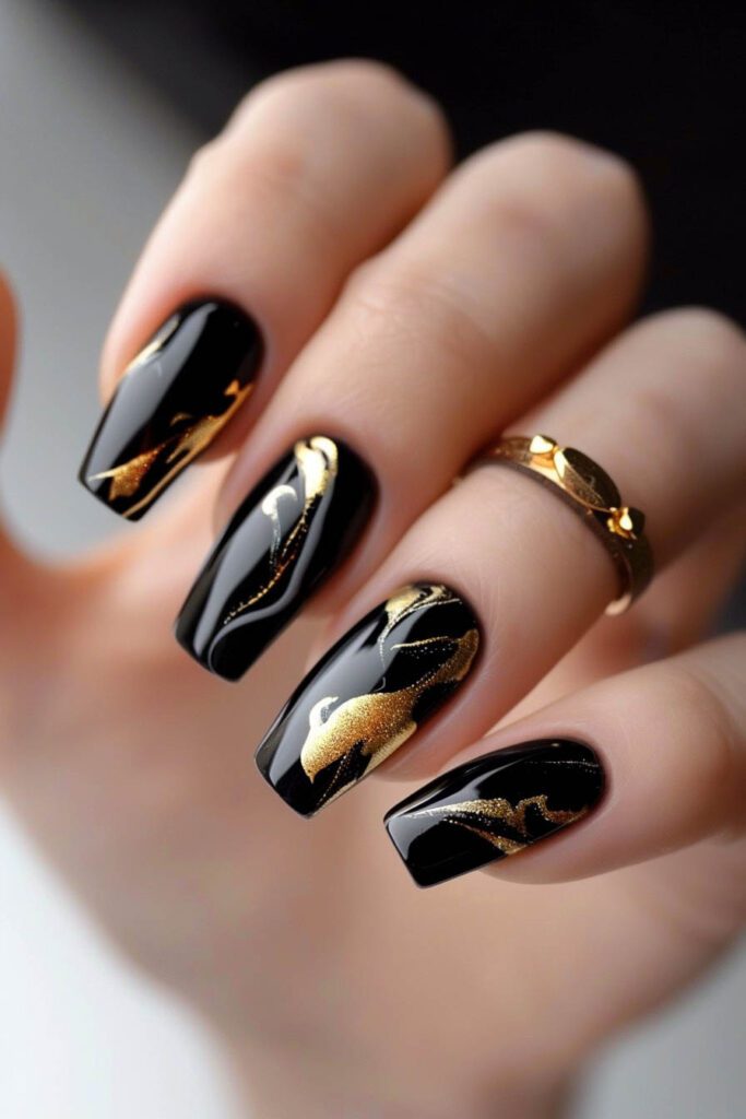 Marble Effect - gold and black nails