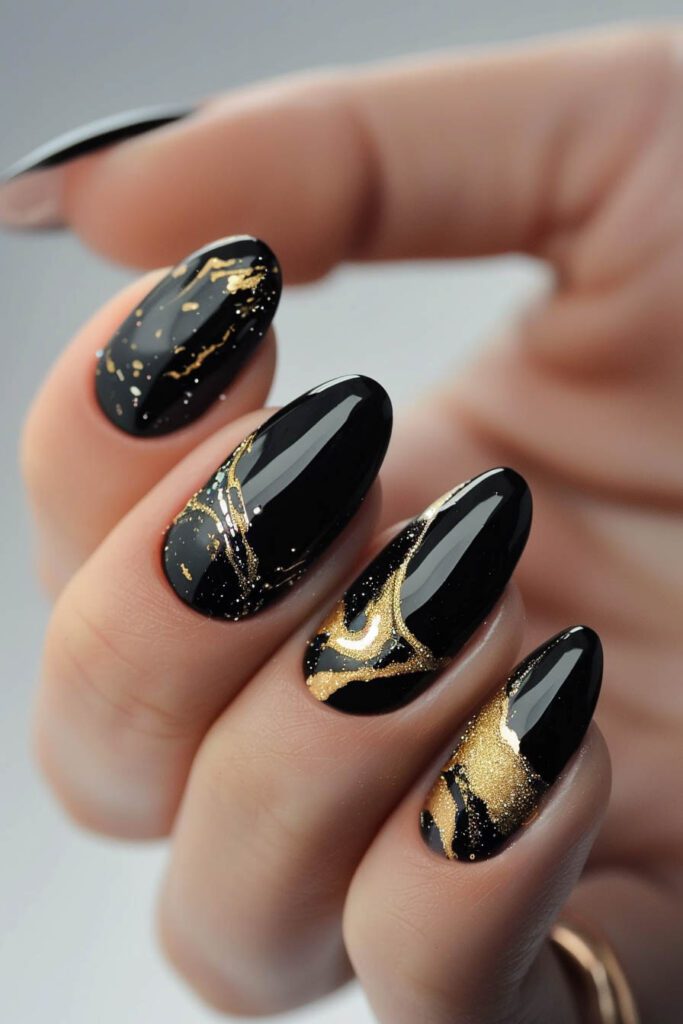 Marble Effect - gold and black nails