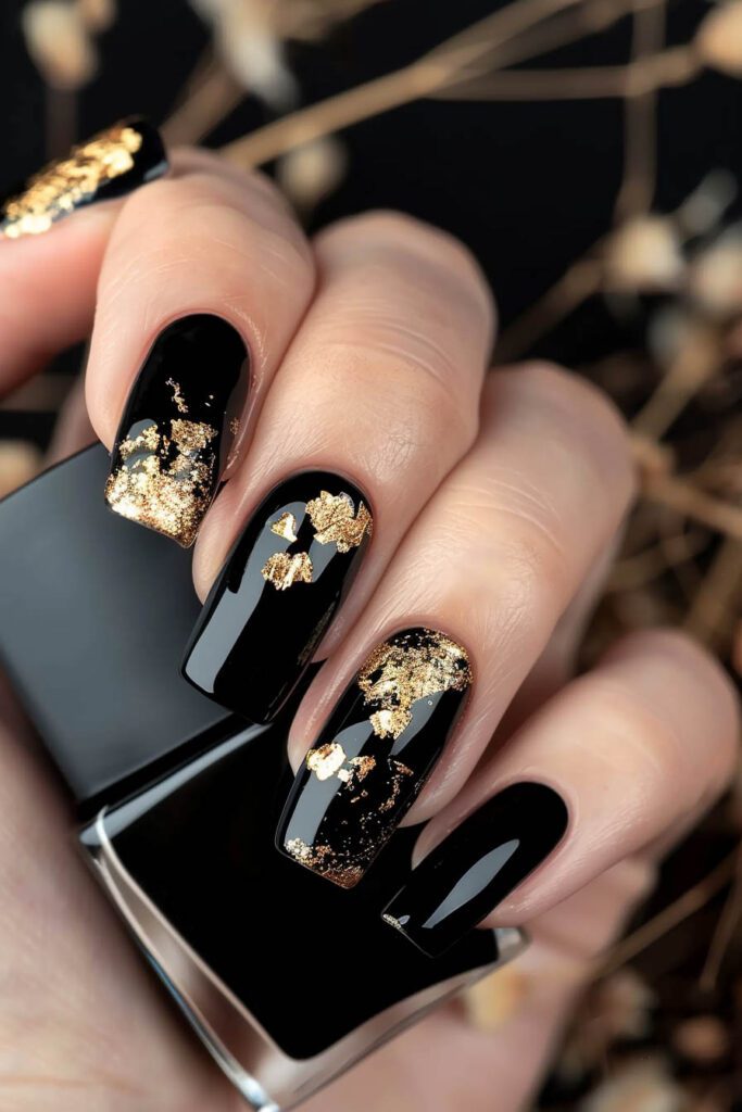 Gold Flakes - gold and black nails