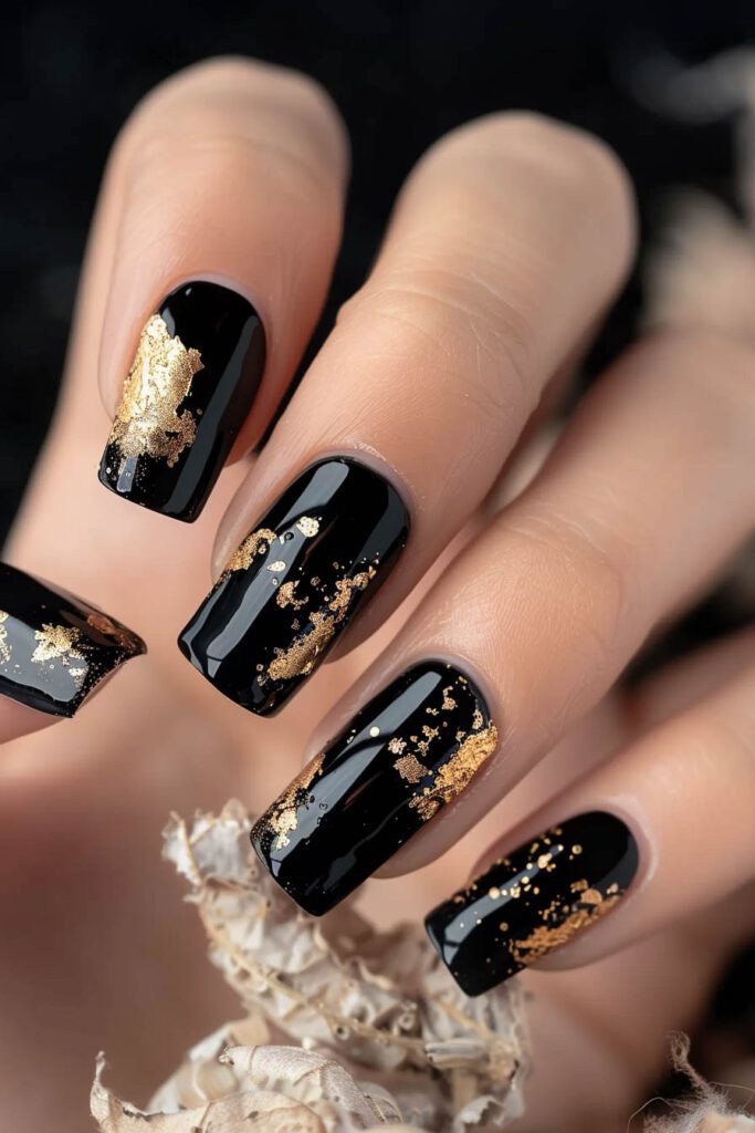 Gold Flakes - gold and black nails