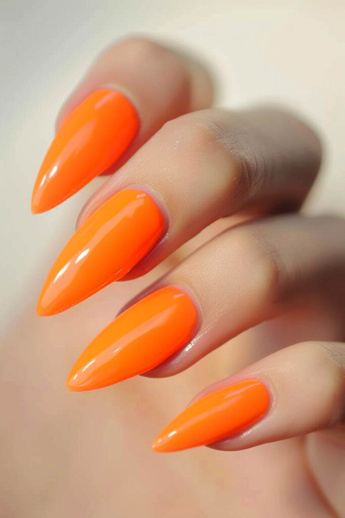 31. Tangerine: Vibrancy, Energy, Playfulness - acrylic nail ideas